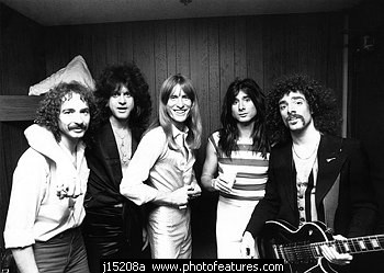 Steve Perry is the girl in the striped shirt